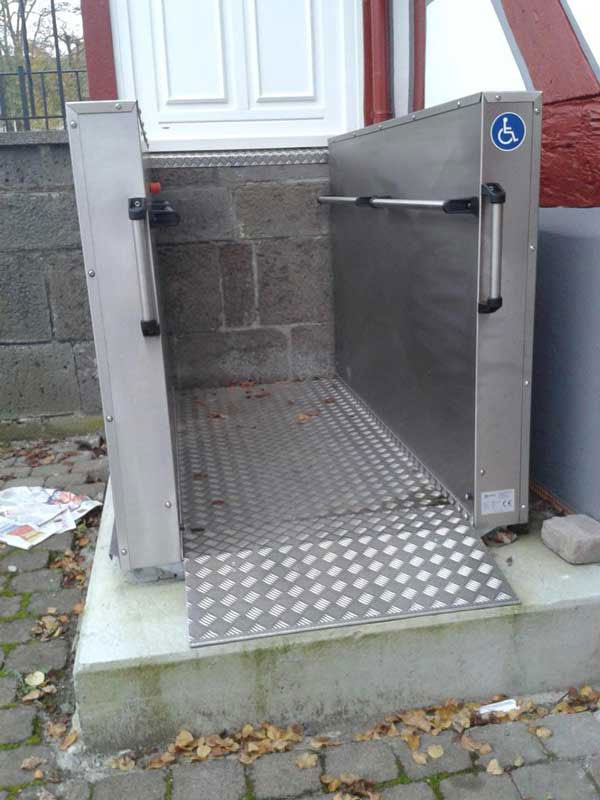 An image of a design flaw a step up to a wheelchair hoist to enter house