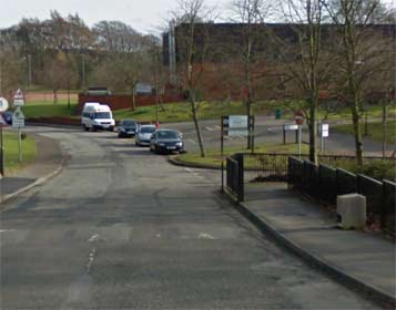 Entrance to Beeslack High School disabled parking on right